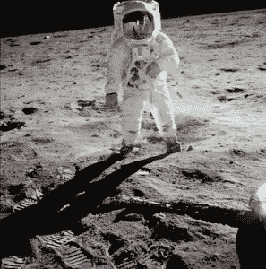 Apollo 11 photo: AS11-40-5903 . Buzz Aldrin with Neil Armstrong reflected in his visor.