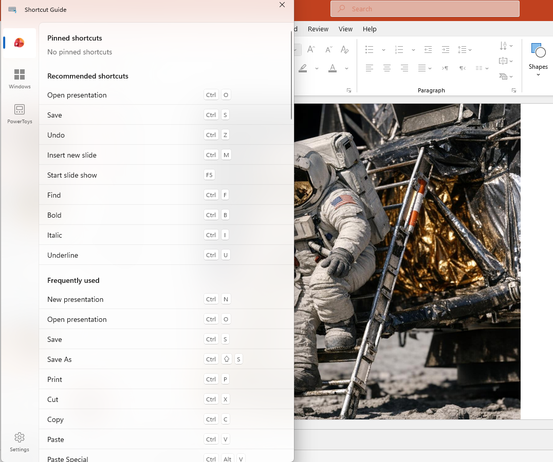 PowerPoint shortcut guide showing astronaut with ladder and lunar module : Office-Watch.com