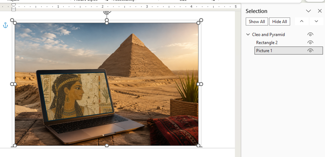 Laptop displaying ancient Egyptian art layered over a pyramid in the desert. : Office-Watch.com