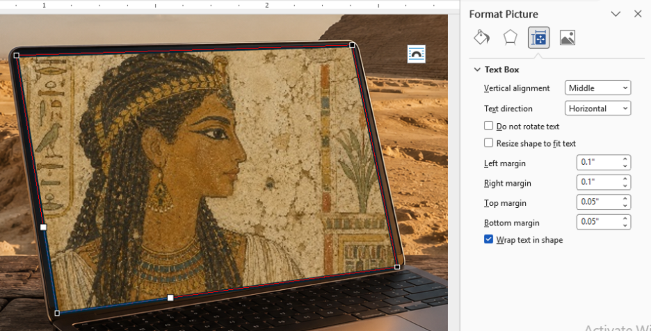 Laptop displaying an Egyptian mosaic, with formatting options open in Office. : Office-Watch.com