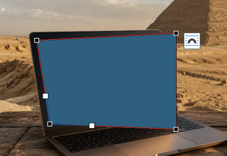 Laptop screen with a blue overlay, set against a desert and pyramid background. : Office-Watch.com